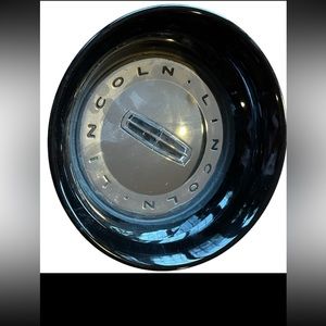 - Black stoneware nine inch serving bowl by Mainstays.